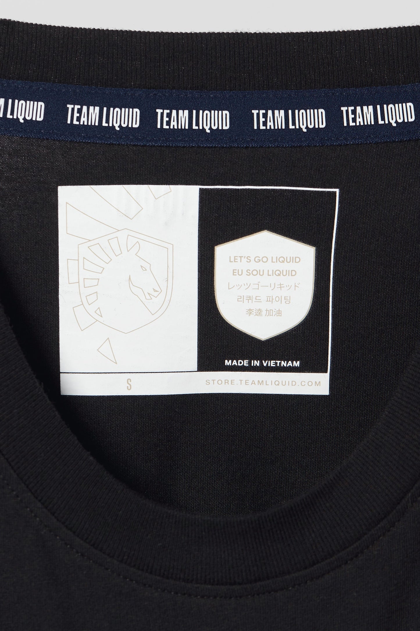 TEAM LIQUID VARSITY SHORT SLEEVE POCKET TEE