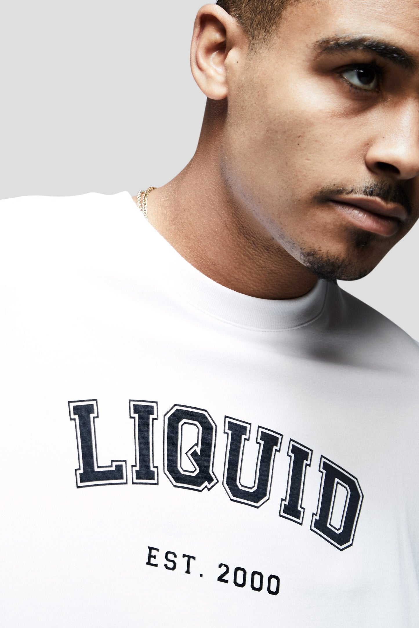 LIQUID VARSITY FONT SHORT SLEEVE TEE